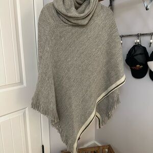 Roots cowl neck poncho/shawl. Never been worn.